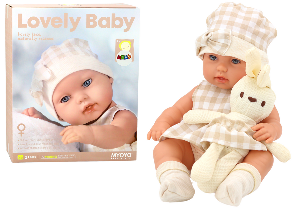 Baby Doll In A Carrier A Bunny In A Checkered Outfit Beige