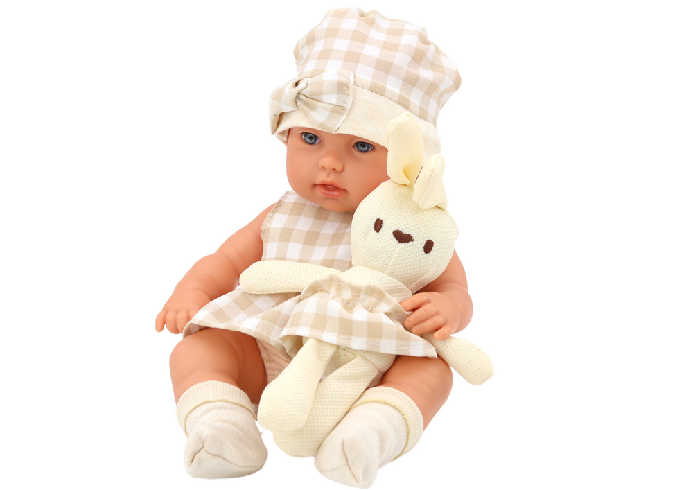 Baby Doll In A Carrier A Bunny In A Checkered Outfit Beige