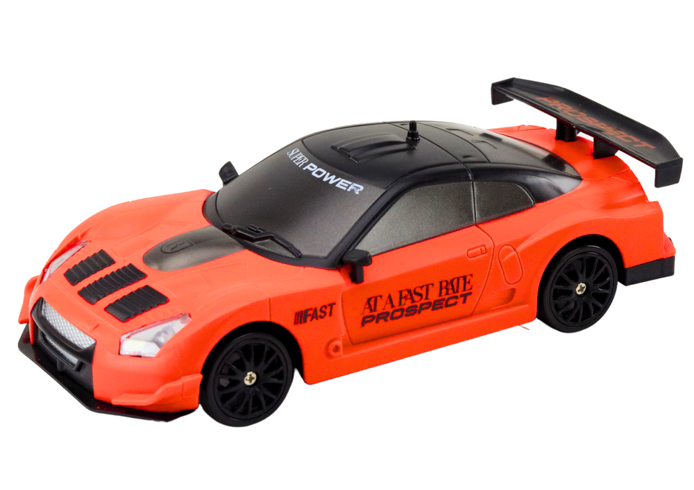 Remote Controlled R/c Sports Car 1:24 Orange Interchangeable Wheels