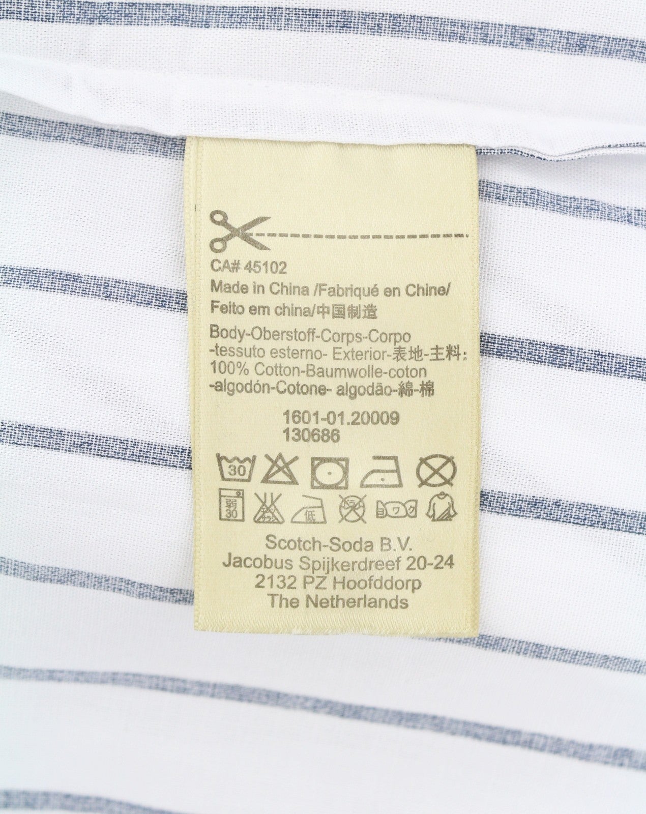 Koszula męska Scotch & Soda, biała, w prążki, o długim kroju, zapinana na guziki, z szerokim dekoltem