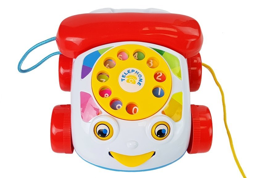 A Pull Phone On Wheels With A Battery Handler For A Baby