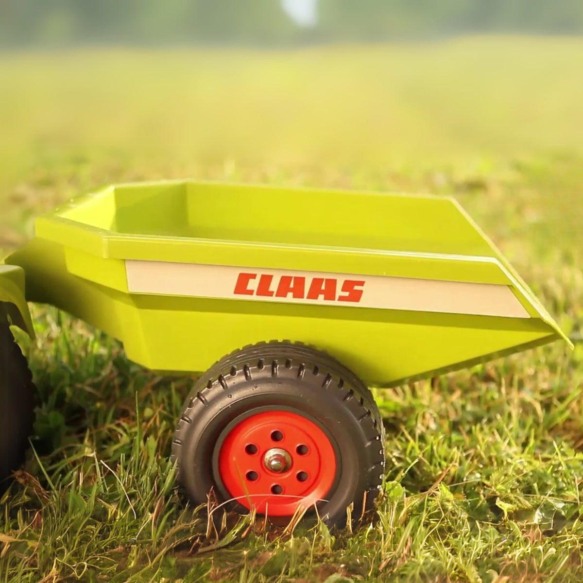 Falk Baby Claas Axos 310 zelený traktor s prívesom od 1 roka