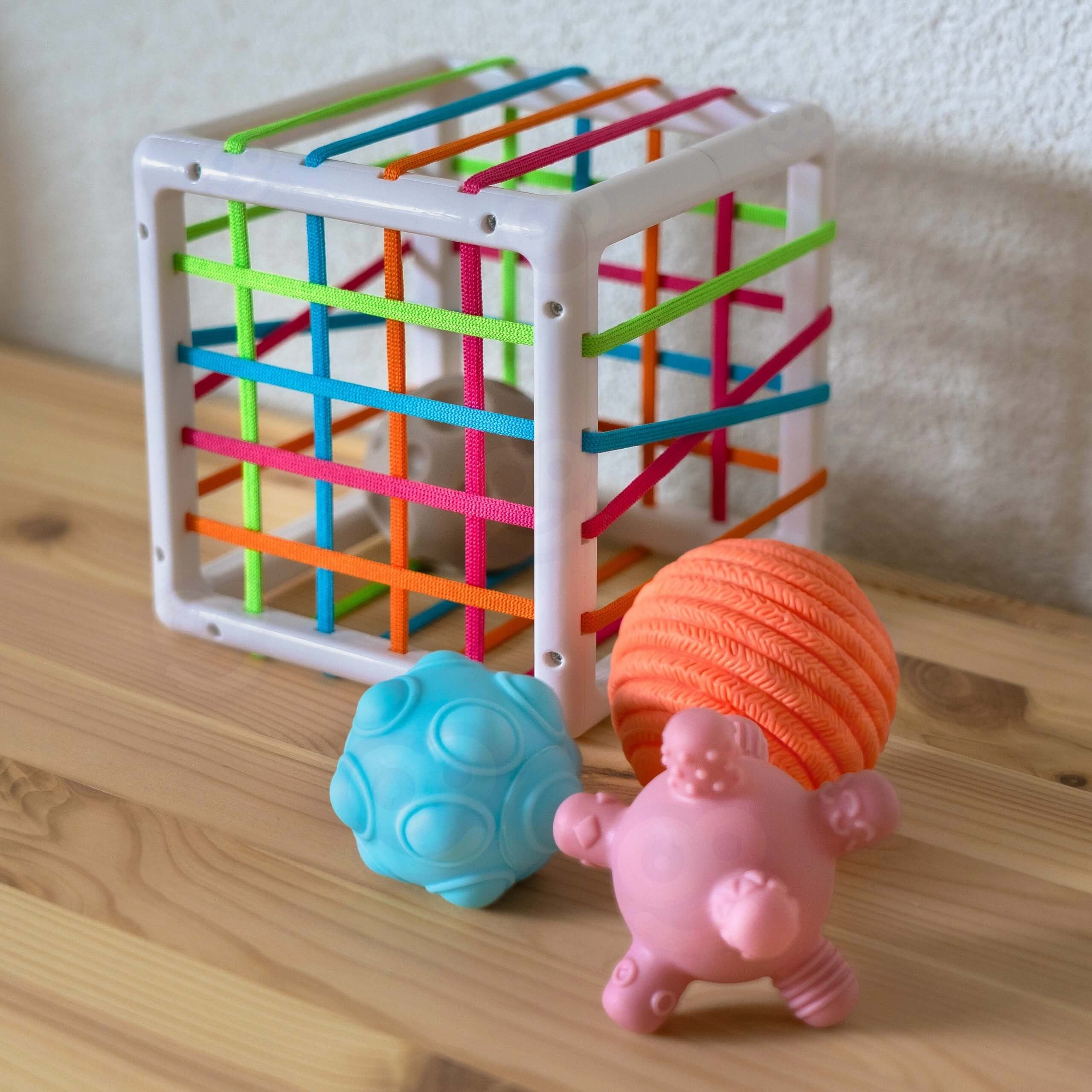 Woopie Baby Elastyczny sortownik kostek sensorycznych dla dzieci Crazy Shapes 5 szt.