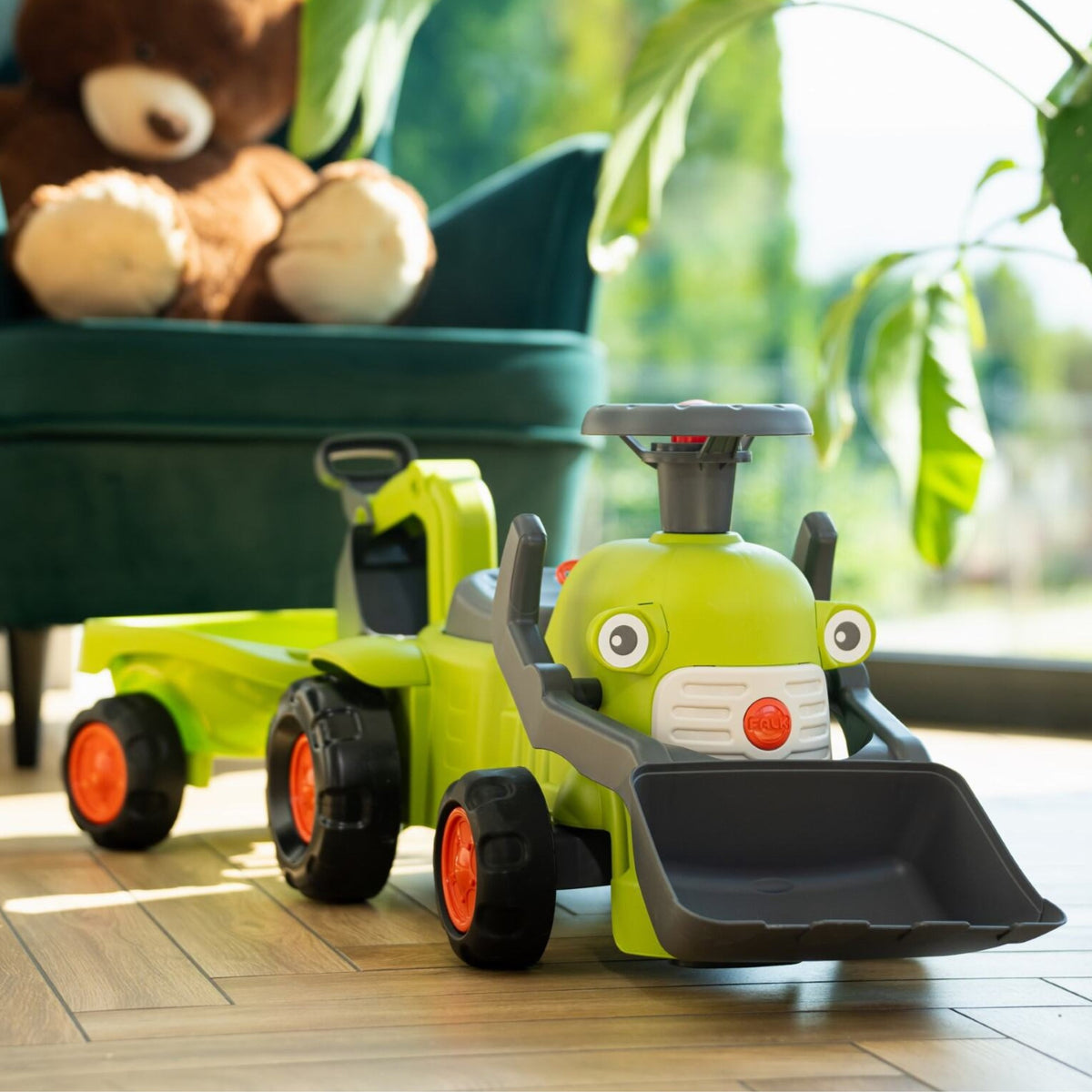 Falk Claas Aufsitztraktor mit Anhängerlader und Schaufel