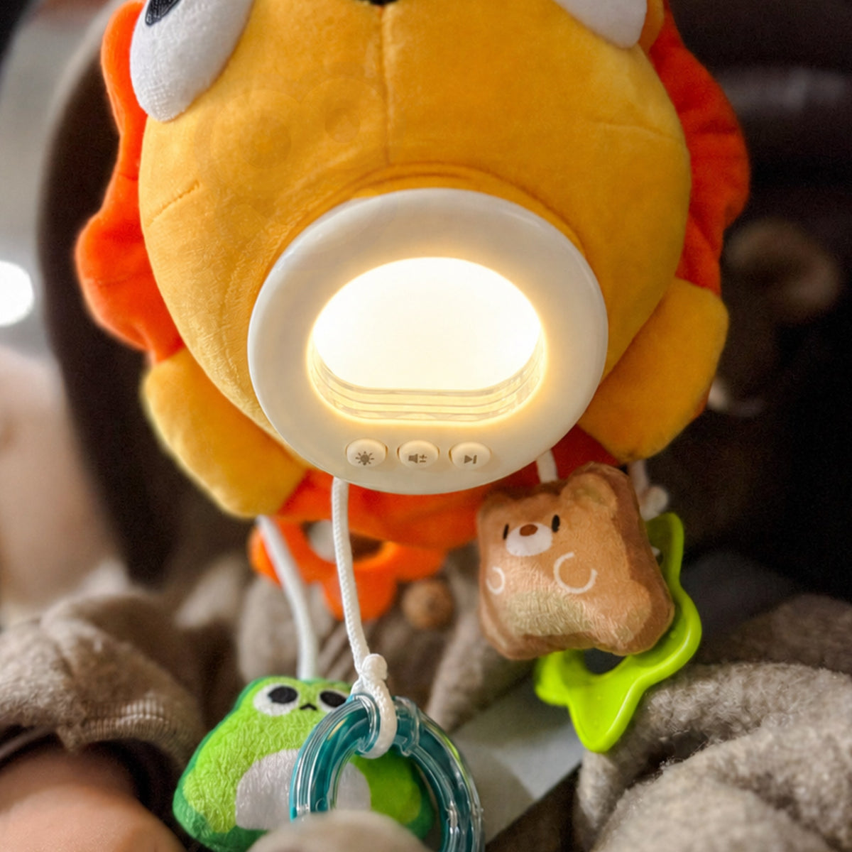 Woopie Baby Plush Lion Peluche musicale interactive avec pendentifs et anneaux de dentition
