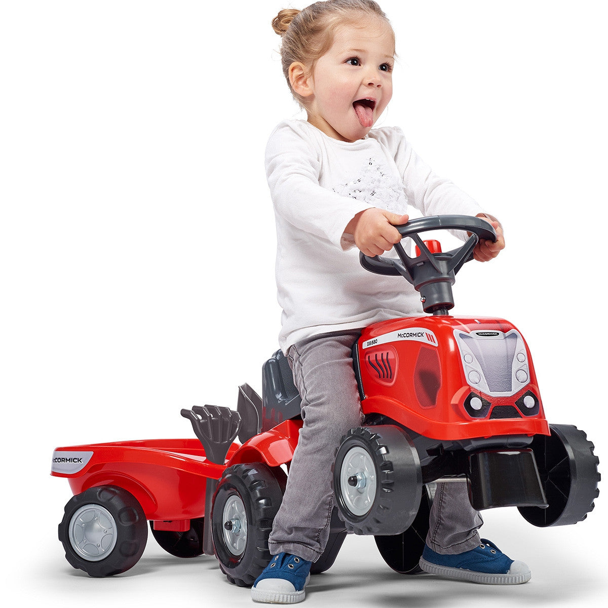 Czerwony traktor Falk Baby Mac Cormick z przyczepą i akcesoriami od 1 roku