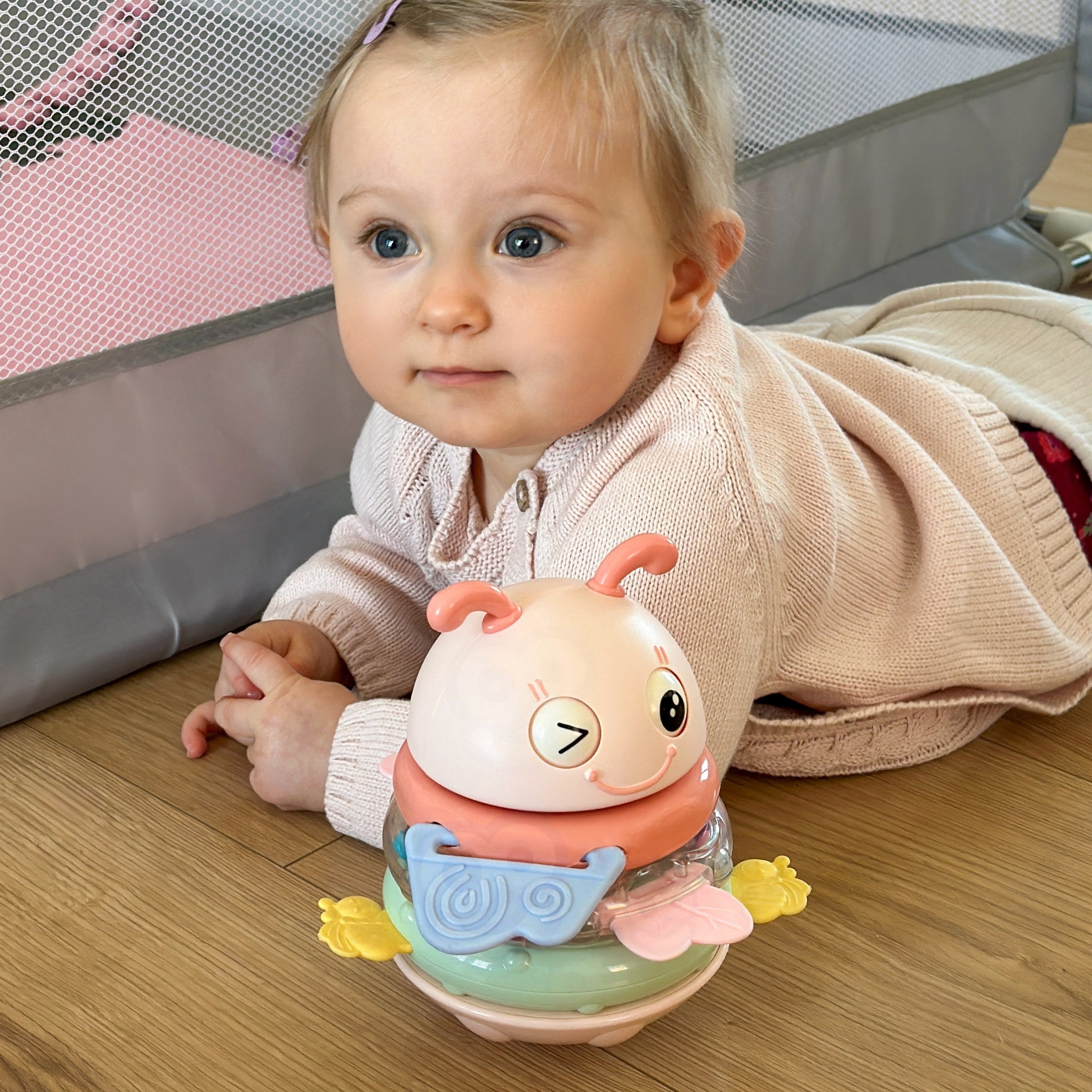 Woopie Baby Wanka álló érzékszervi játék 2 az 1-ben csörgő fogas rózsaszín