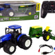 Blue Tractor With Baler