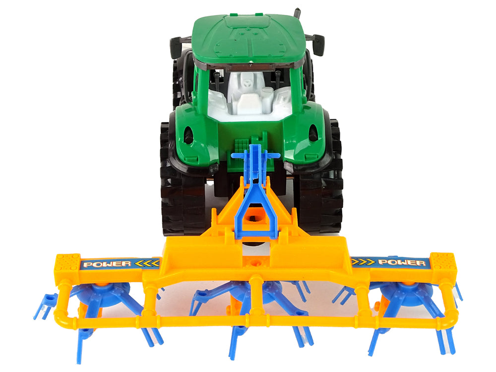 Green Tractor With Orange And Blue Rake Friction Drive
