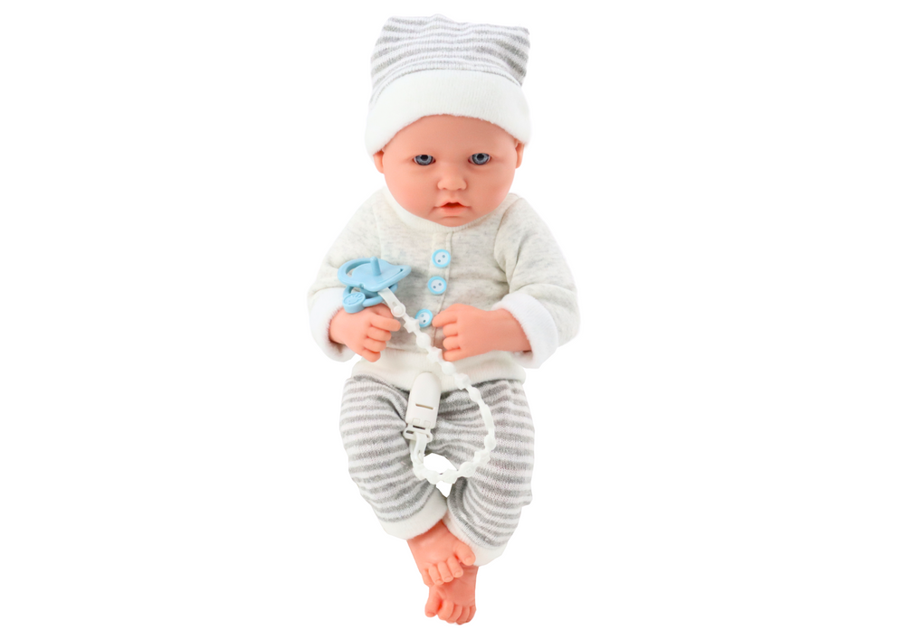 Babypop In Wit En Grijs Gestreepte Kleding Hoed Fopspeen Quilt