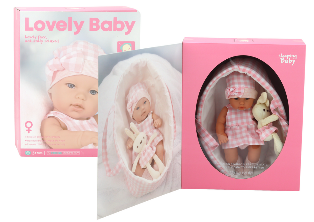 Baby Doll In A Bunny Carrier In A Pink Checkered Outfit