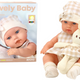 Baby Doll In A Carrier A Bunny In A Checkered Outfit Beige