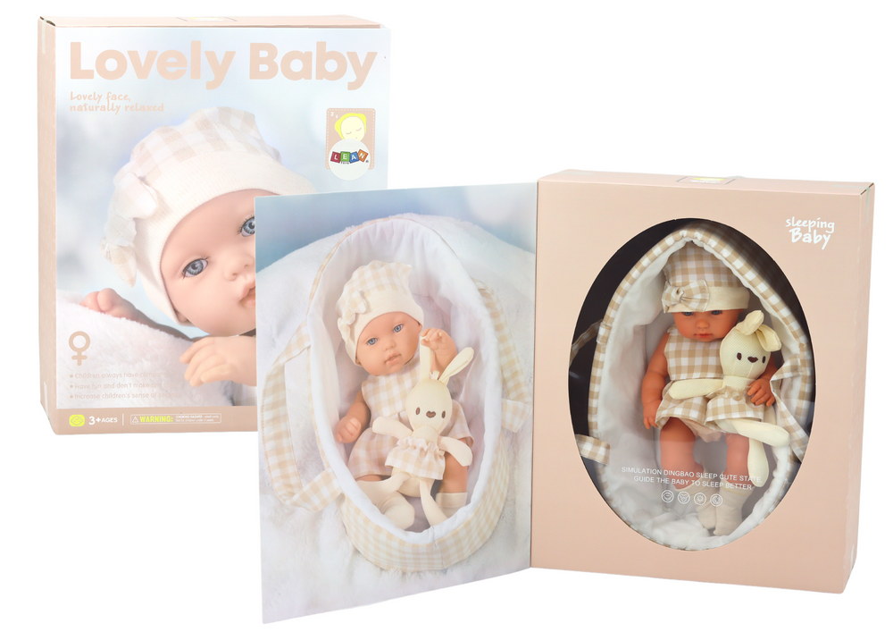 Baby Doll In A Carrier A Bunny In A Checkered Outfit Beige