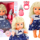Doll In Navy Blue Dress Peeing Bottle Rattle Sounds