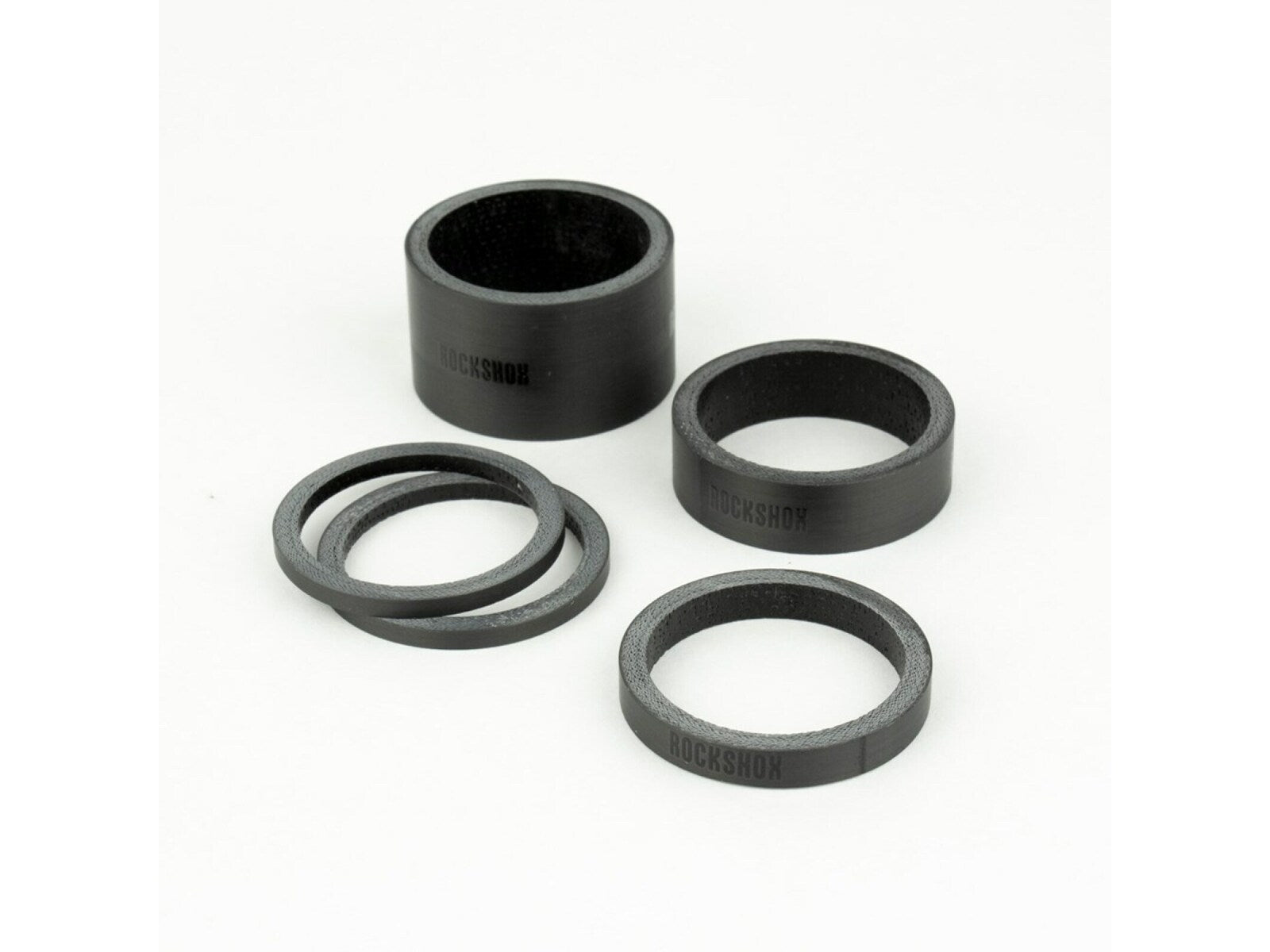 Rockshox Rockshox Headset Spacer Set Ud Carbon Gloss Black Logo (2.5mm X 2 5mm X 1 10mm X 1 20mm X 1) Schwarz