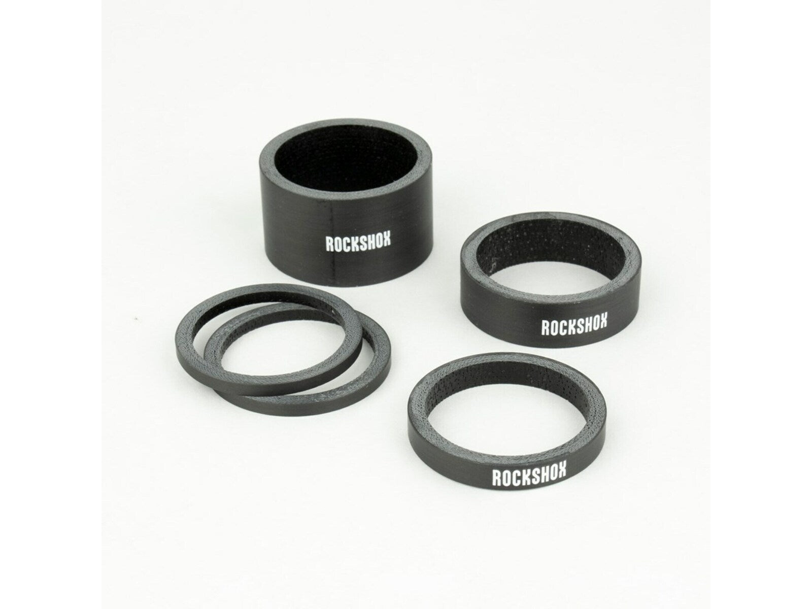 Rockshox Rockshox Headset Spacer Set Ud Carbon Gloss White Logo (2.5mm X 2 5mm X 1 10mm X 1 20mm X 1) Schwarz