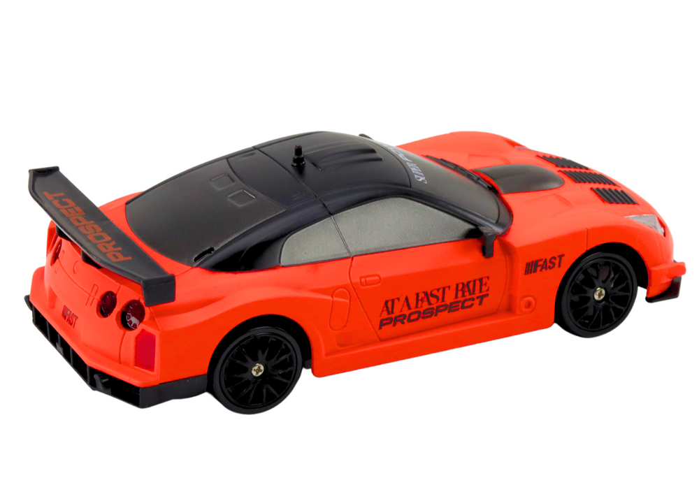 Remote Controlled R/c Sports Car 1:24 Orange Interchangeable Wheels