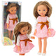 Doll In A Pink Dress With A Bow Long Brown Hair