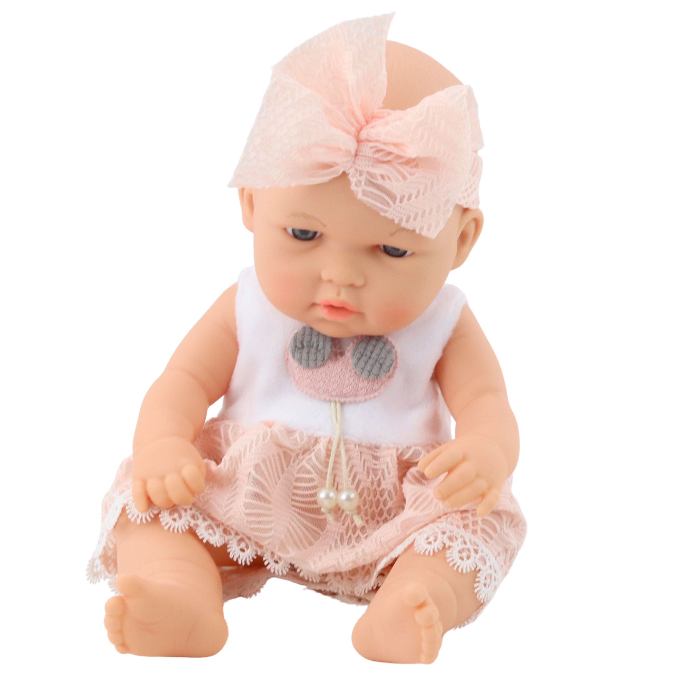 Baby Doll In A Pink Dress Headband Movable Arms And Legs 30cm