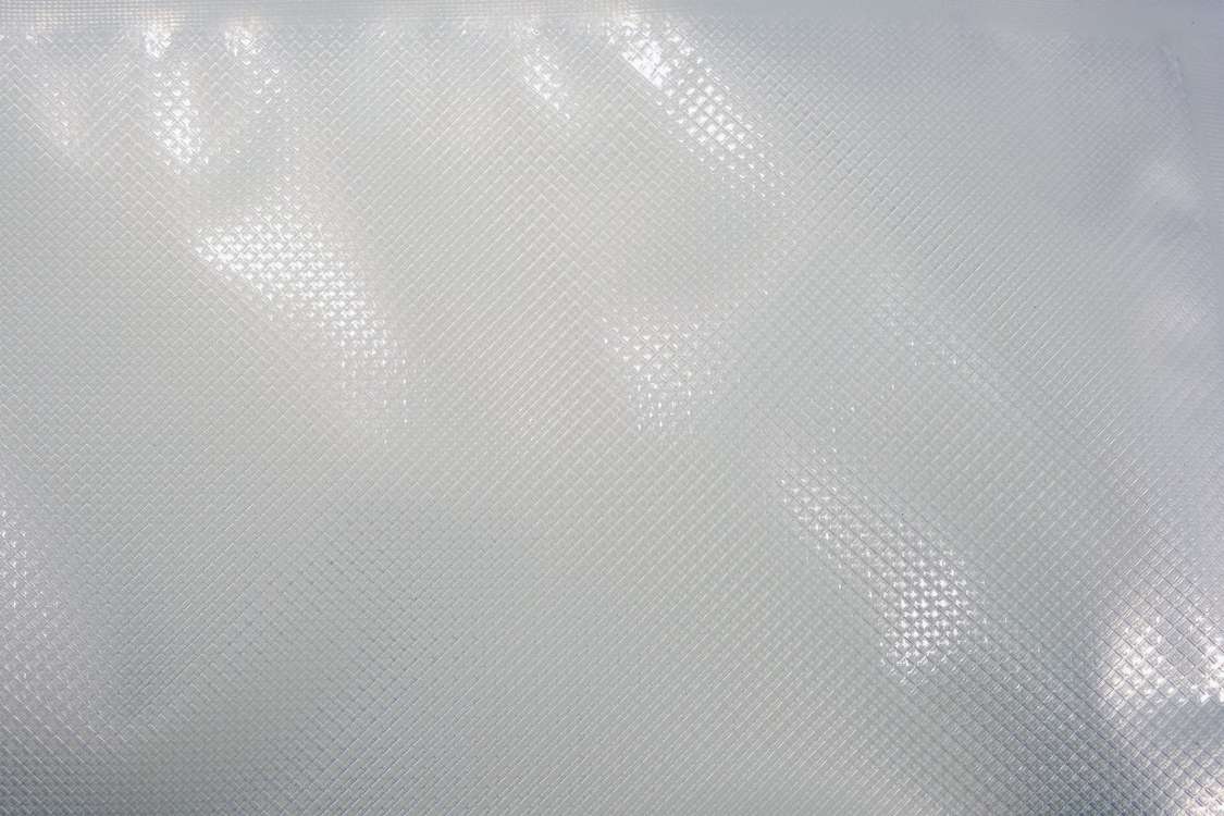 Vázaná fólie pro vakuové balení v roli 25x600cm.