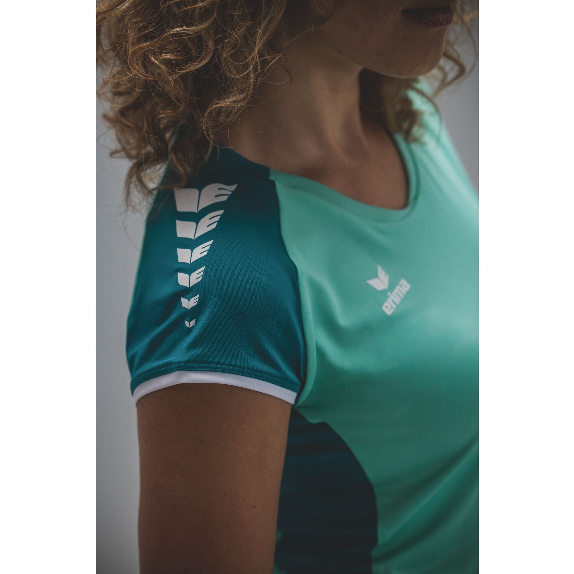 Funkcia tielka Erima Wings Mint/tahitian Blue