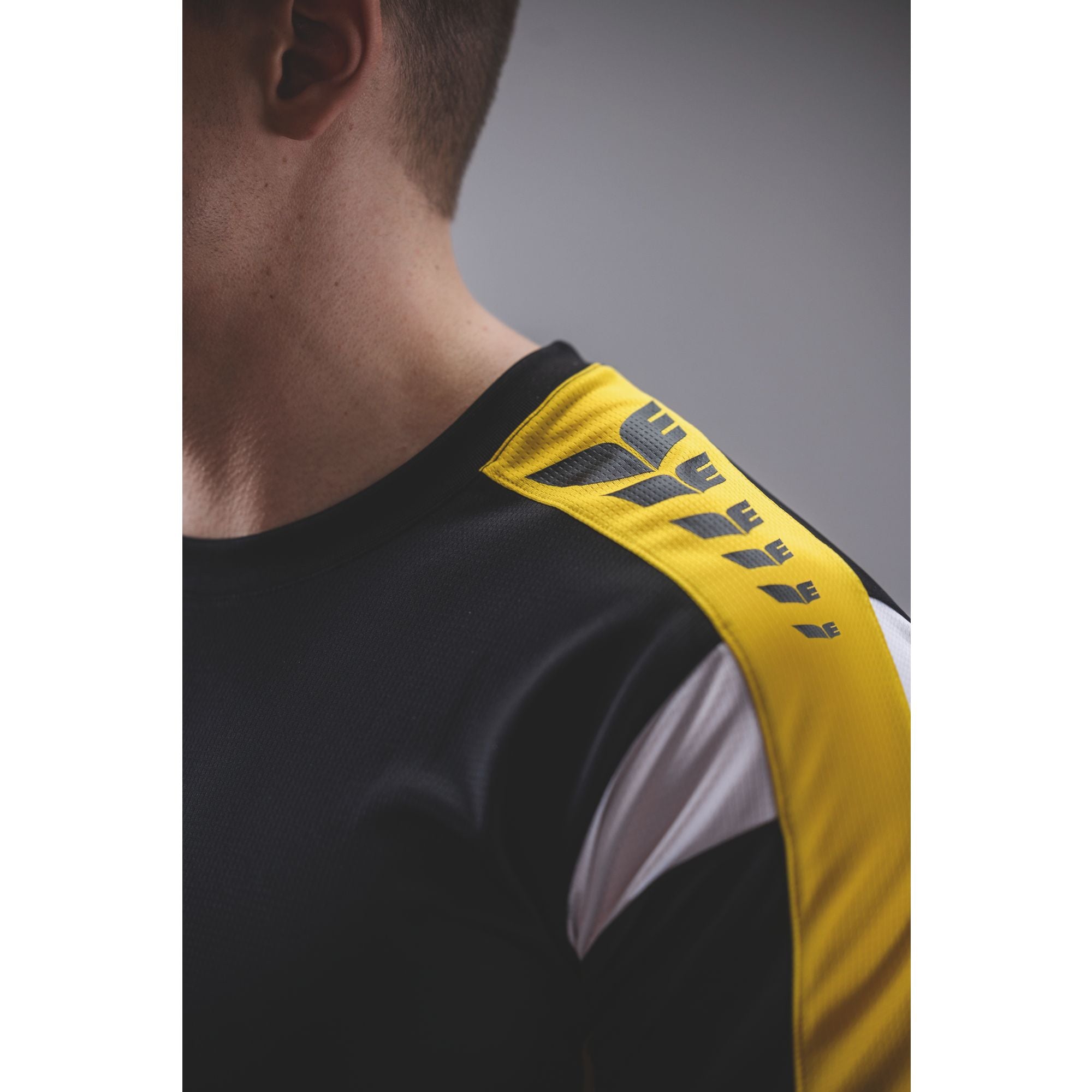 Erima Celebrate 125 Camiseta Función Negro/amarillo