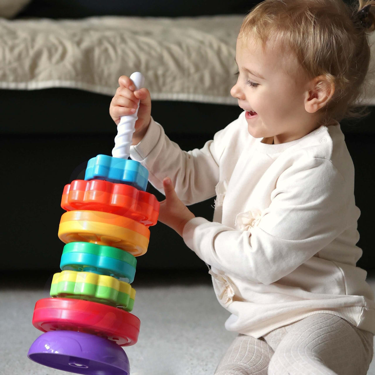 Piramida edukacyjna Woopie Baby z przekręconą wieżą ze zwierzętami