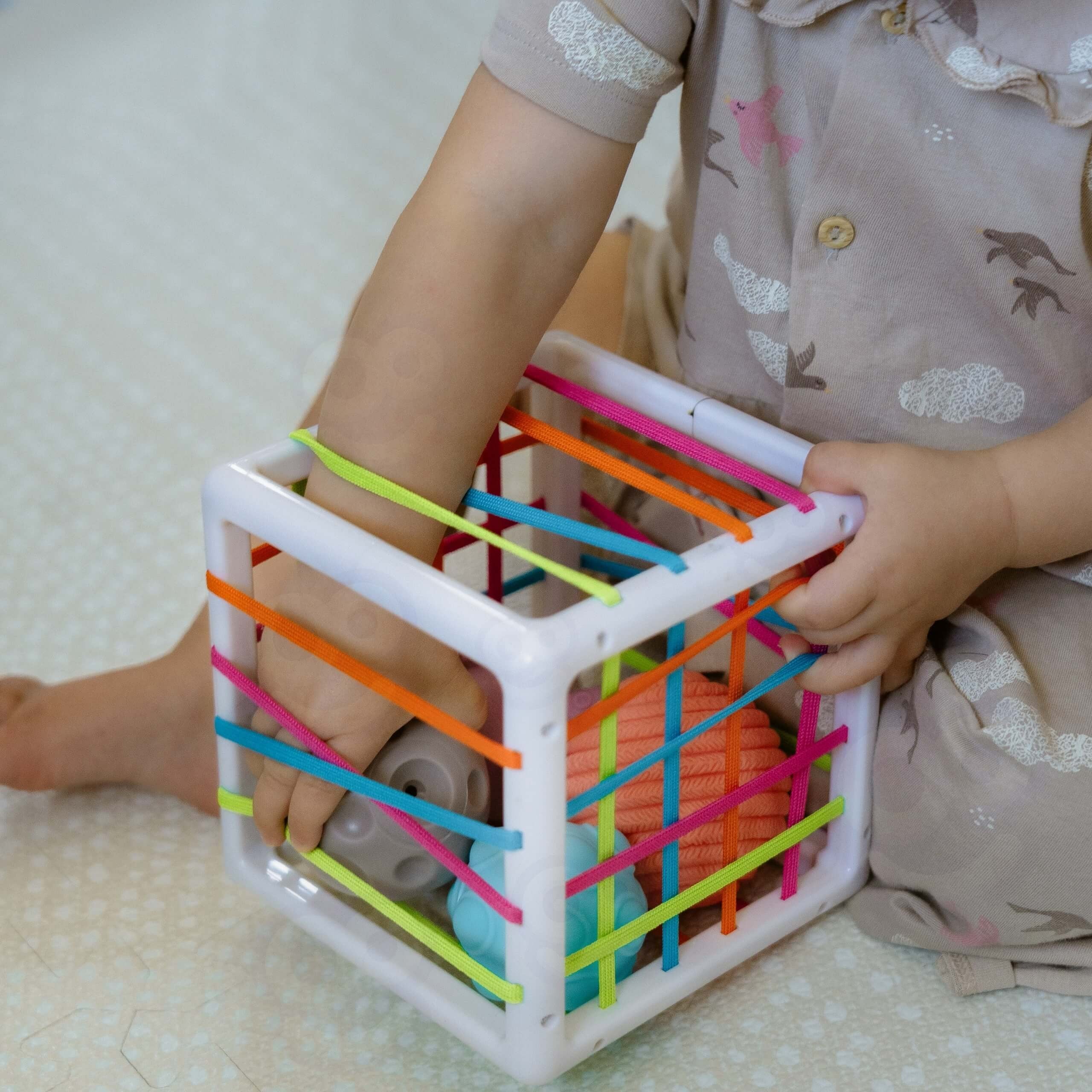 Woopie Baby Elastyczny sortownik kostek sensorycznych dla dzieci Crazy Shapes 5 szt.