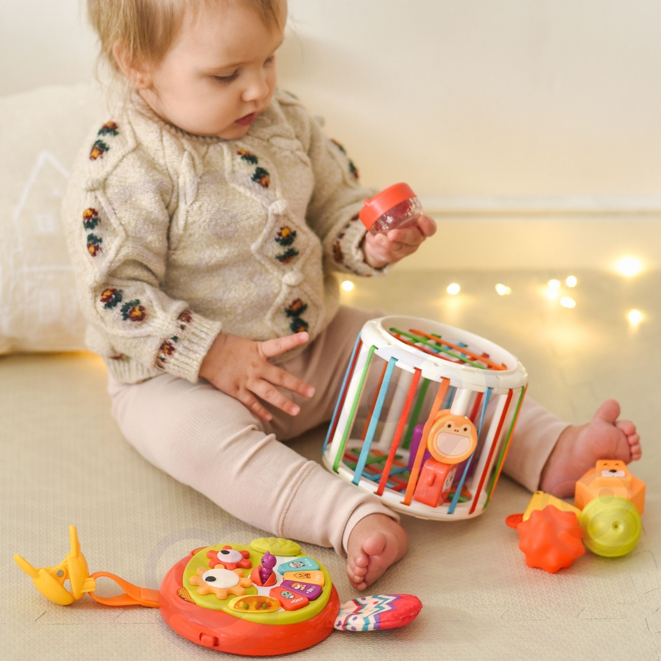 Interaktivní buben Woopie Baby Roller Sensory Cube