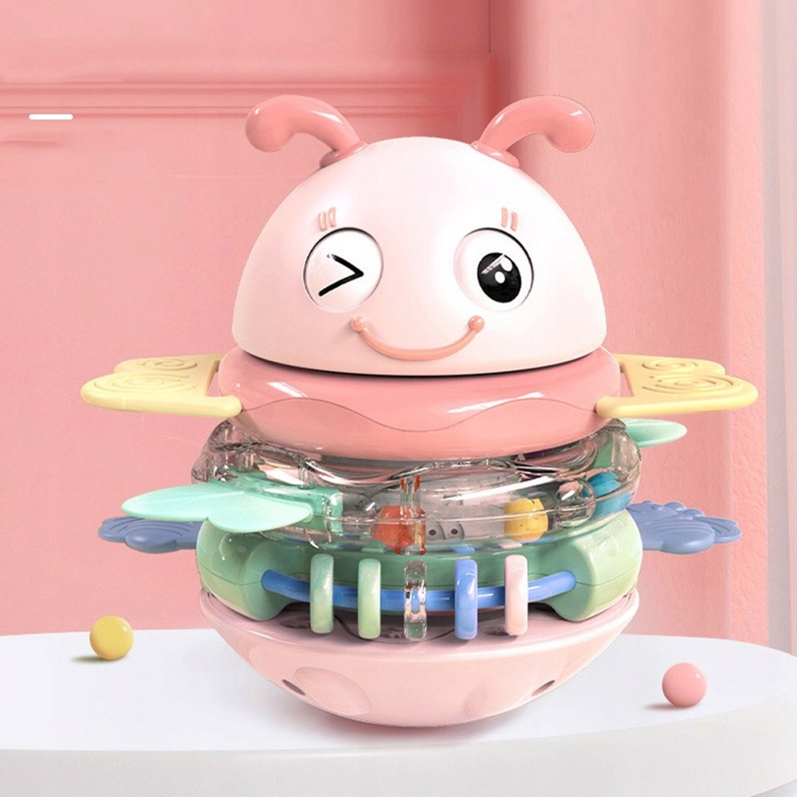 Woopie Baby Wanka Stand Up Sensory Toy 2 i 1 Rattle Teether Rosa