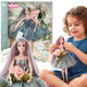 Woopie Royal Emi pop in een elegante tule jurk met strik en boeket
