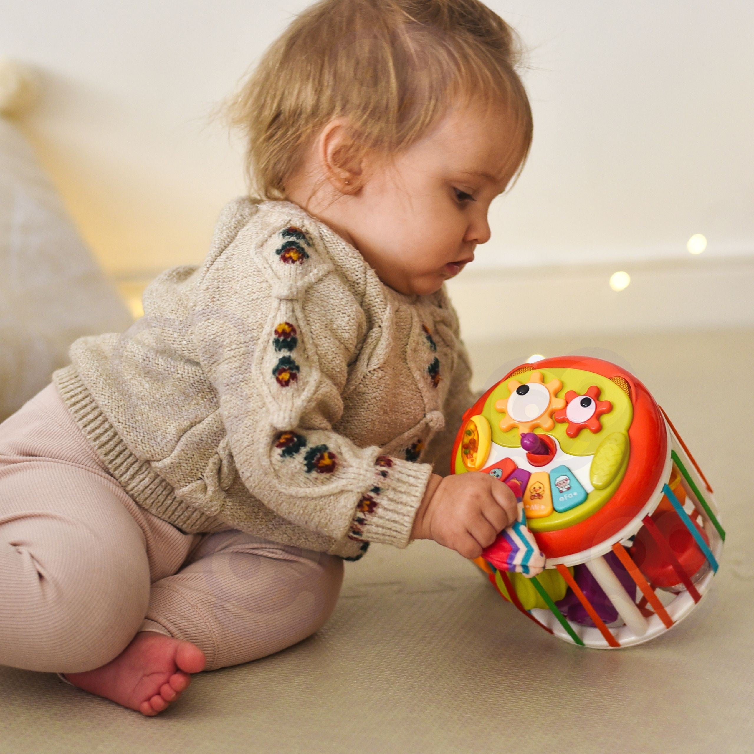 Interaktivní buben Woopie Baby Roller Sensory Cube