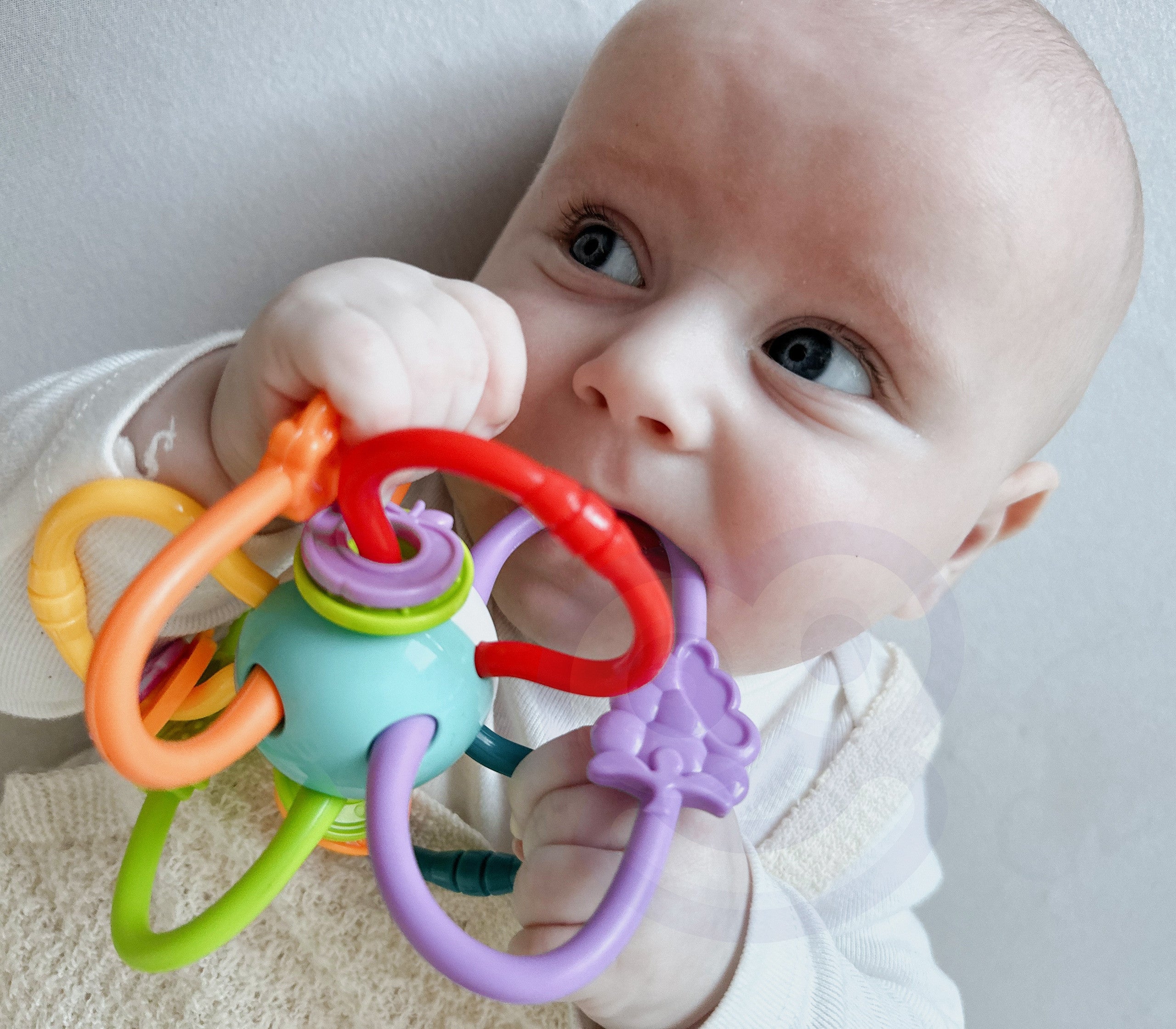 Woopie baba érzékszervi játék csörgő fogzás 2 az 1-ben