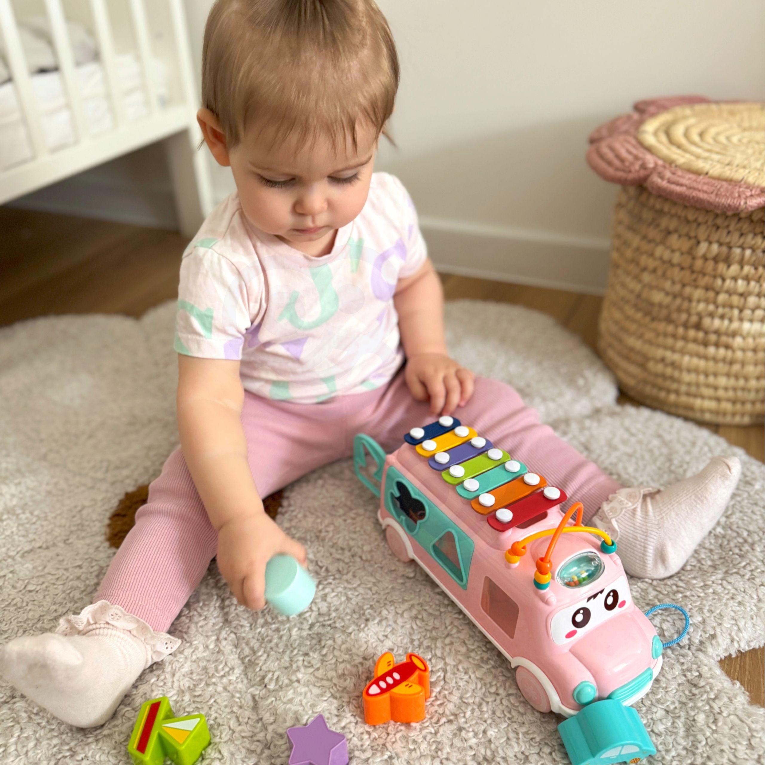 Classificador de carros musicais Woopie Baby com pratos rosa