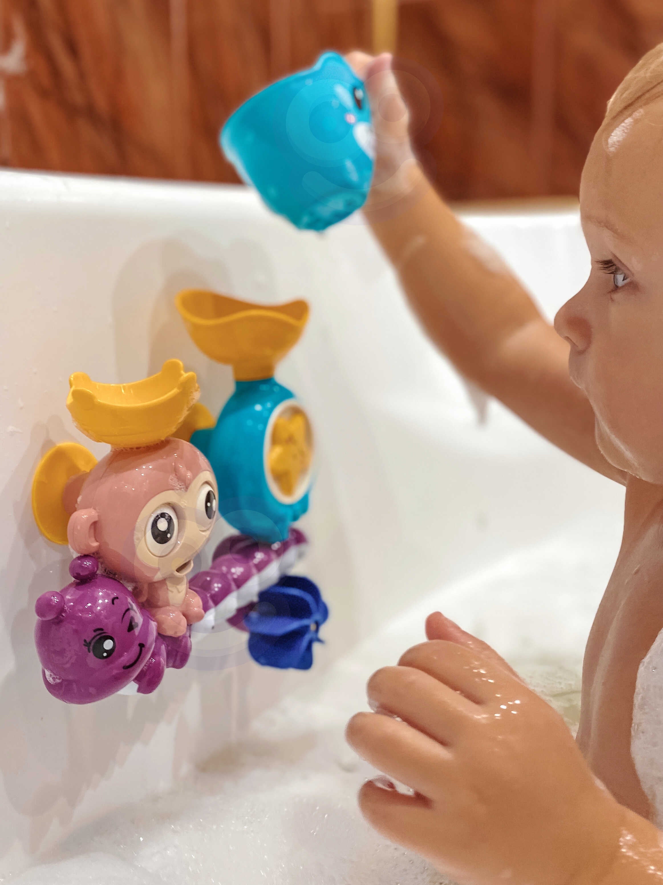 Woopie Baby Monkey Badvattenleksak + kopp